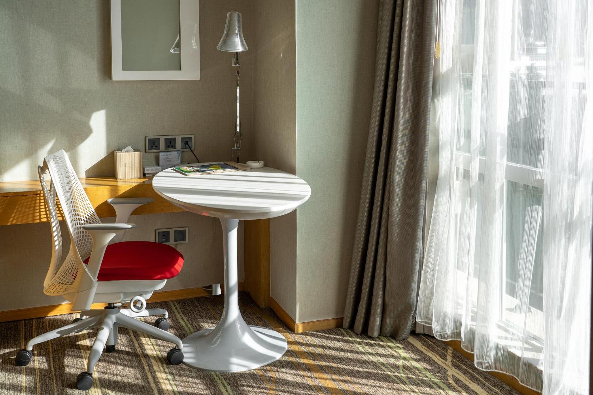 Hilton Garden Inn Lijiang Лицзян Экстерьер фото
